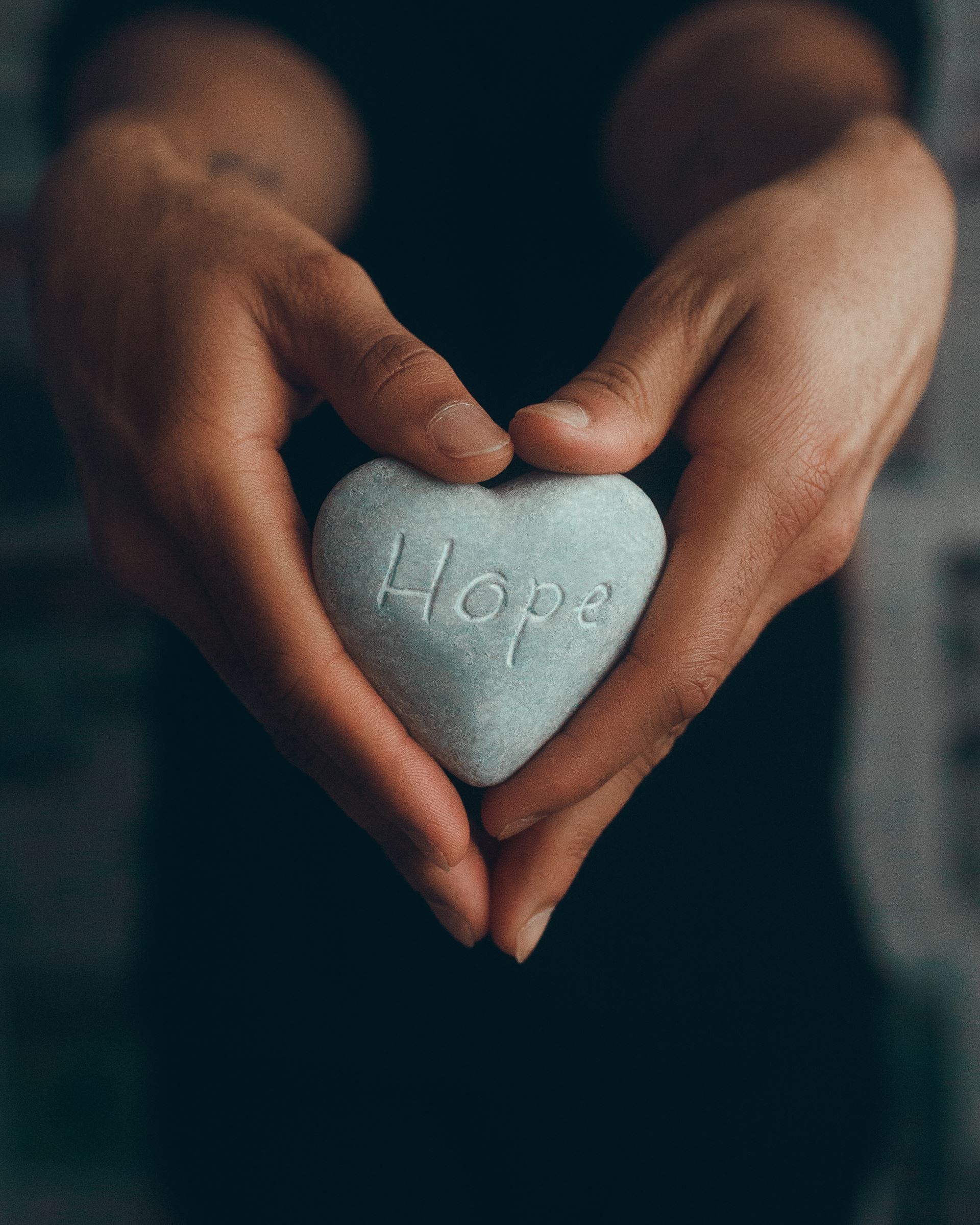 A stone with the word HOPE